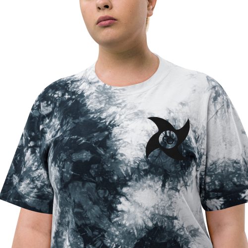 Woman wearing the black and white Ninja Star Tie-Dye T-shirt, close-up of chest logo
