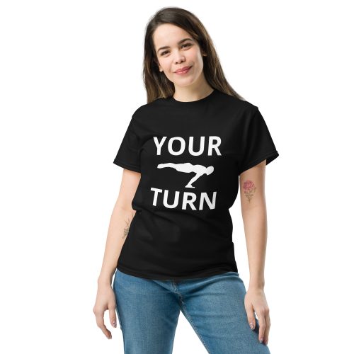 Woman wearing the black Your Turn planche T-shirt